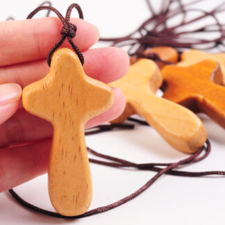 Wood cross on cord